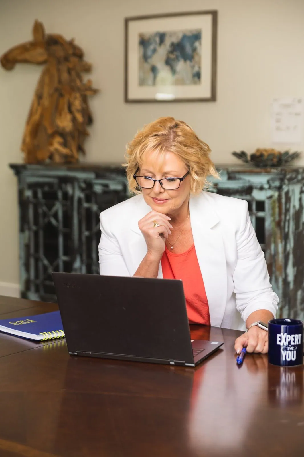 Ann Carden reviewing a client strategy